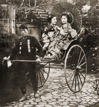 Runner Pulling Two Geishas on a Rickshaw in Japan by Japanese Photographer